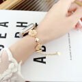 Apple Watch Seri 4 5 6 7 8 9 10 42-38-40-41mm Çiçekli ve Kalp Zincir Detaylı Bileklik Tasarım Kordon Gold